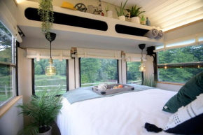 American School Bus Retreat with Hot Tub in Sussex Meadow